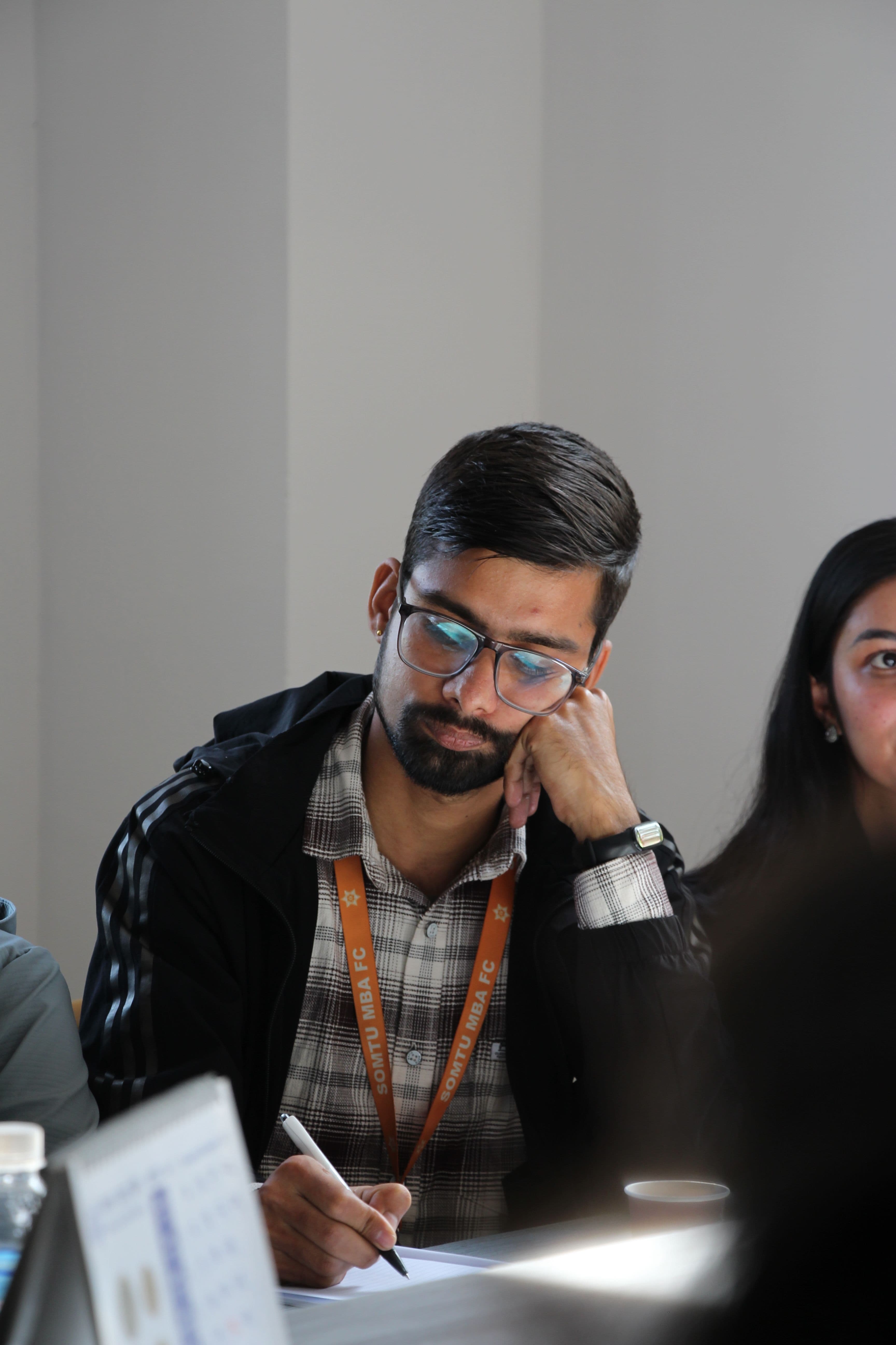 Student concentrating on written work